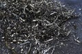 Metal swarf chips scrap cng milling iron close-up