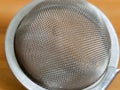 Metal tea strainer in full detail