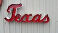 Metal Texas sign hangin on wall