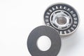 Metal Thrust Roller bearing isolated on white background. Spare part for heavy and automotive industry. Machinery concept