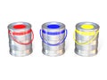 Metal tin cans with basic colors (red, blue and green) paint Royalty Free Stock Photo