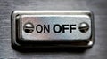 Metal toggle switch showing on off options Royalty Free Stock Photo