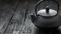 Metal traditional chinese tea pot on wooden floor Royalty Free Stock Photo