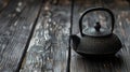 Metal traditional chinese tea pot on wooden floor Royalty Free Stock Photo