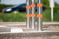 Metal traffic bollard for bike lane. Royalty Free Stock Photo