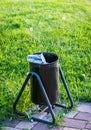 litterbin trash bin in parkland Royalty Free Stock Photo