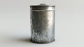 A metal trash can sits on a white floor, perfect for use in interior design, office settings, or as a prop Royalty Free Stock Photo