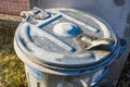 Metal Trash Can With Snow On Top Of Trash Can Lid. close-up Royalty Free Stock Photo