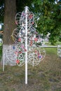 Metal `Tree of Happiness `with` locks of fidelity` for wedding ceremonies in the park `Love and Fidelity`. Historically restored p