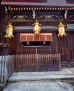 The tsuriÃ¢â¬âdoro hanging lamp on the Shaden Sanctuary of Kitano Tenmangu shrine. Kyoto. Japan Royalty Free Stock Photo