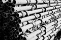Metal tubes stack piled together scaffolding ledger members Royalty Free Stock Photo