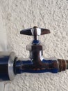 metal valve to regulate the level of water circulation