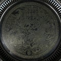 Metal vintage tray with floral pattern on black isolated background Royalty Free Stock Photo