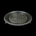 Metal vintage tray with floral pattern on black isolated background Royalty Free Stock Photo