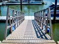 Metal walkway ladder docked in the port