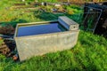 Metal water container at the allotments Royalty Free Stock Photo