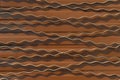 Metal wavy abstract fence surface patterns steel brown texture iron background backdrop structure Royalty Free Stock Photo