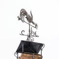 Metal weather vane in the form of a rooster