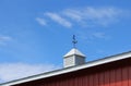 Metal weathervane decorates the roof