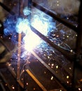 Metal welding. Sparks from electric heating. Iron, materials.Artistic welding sparks light, industrial background