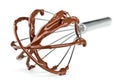 Metal whisk with chocolate