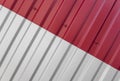 Metal white and red sheet for industrial building and construction. Roof sheet metal or corrugated roofs of factory Royalty Free Stock Photo