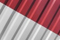 Metal white and red sheet for industrial building and construction. Roof sheet metal or corrugated roofs of factory Royalty Free Stock Photo