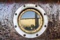 .Metal window porthole on the ship