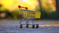 Metal wire small shopping cart for mall, supermarket trolley. Empty bag on wheels to carry heavy items, purchasing Royalty Free Stock Photo