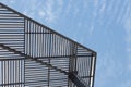 Metal and wood massive urban shade structure, blue sky copy space