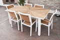 Metal and wood outdoor patio furniture for dining Royalty Free Stock Photo