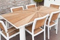 Metal and wood outdoor patio furniture for dining Royalty Free Stock Photo