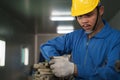 Metal work factory worker working with lathe machine in lathe workshop Royalty Free Stock Photo