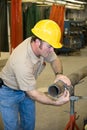 Metal Worker Measures Pipe Royalty Free Stock Photo