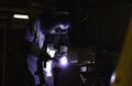 Metal workers use manual labor. Skilled welder. Factory workers making OT. Welder is welding the steel in the factory
