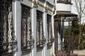 Metal wrought-iron bars on windows of apartment house Royalty Free Stock Photo