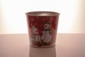 Metal zink Christmas buckets snowmans red background