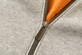 Metal zipper on the sports jacket. Close up. Selective focus Royalty Free Stock Photo