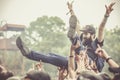 Metalhead during a crowdsurfing at a metal concert