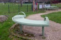 Metalic bench in the park playground