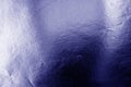 Metalized plasrtic wrap texture with crumples in blue color Royalty Free Stock Photo