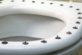 Metall circle sharp buttons on the top of toilet Royalty Free Stock Photo