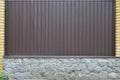 Metall wall texture with stone foundation