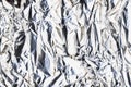 Metallic abstract background crinkled foil texture