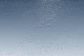 Metallic background with light blue gradient and rough texture creating an abstract pattern Royalty Free Stock Photo