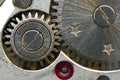 Metallic Background with metal cogwheels a clockwork. Macro Royalty Free Stock Photo