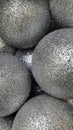 Metallic balls. Silver balls with sparkles. Festive background o