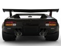 Metallic black eighties sports car - back view closeup shot