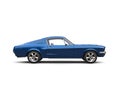 Metallic blue American vintage muscle car - side view