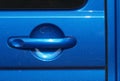 Metallic blue car door handle Royalty Free Stock Photo